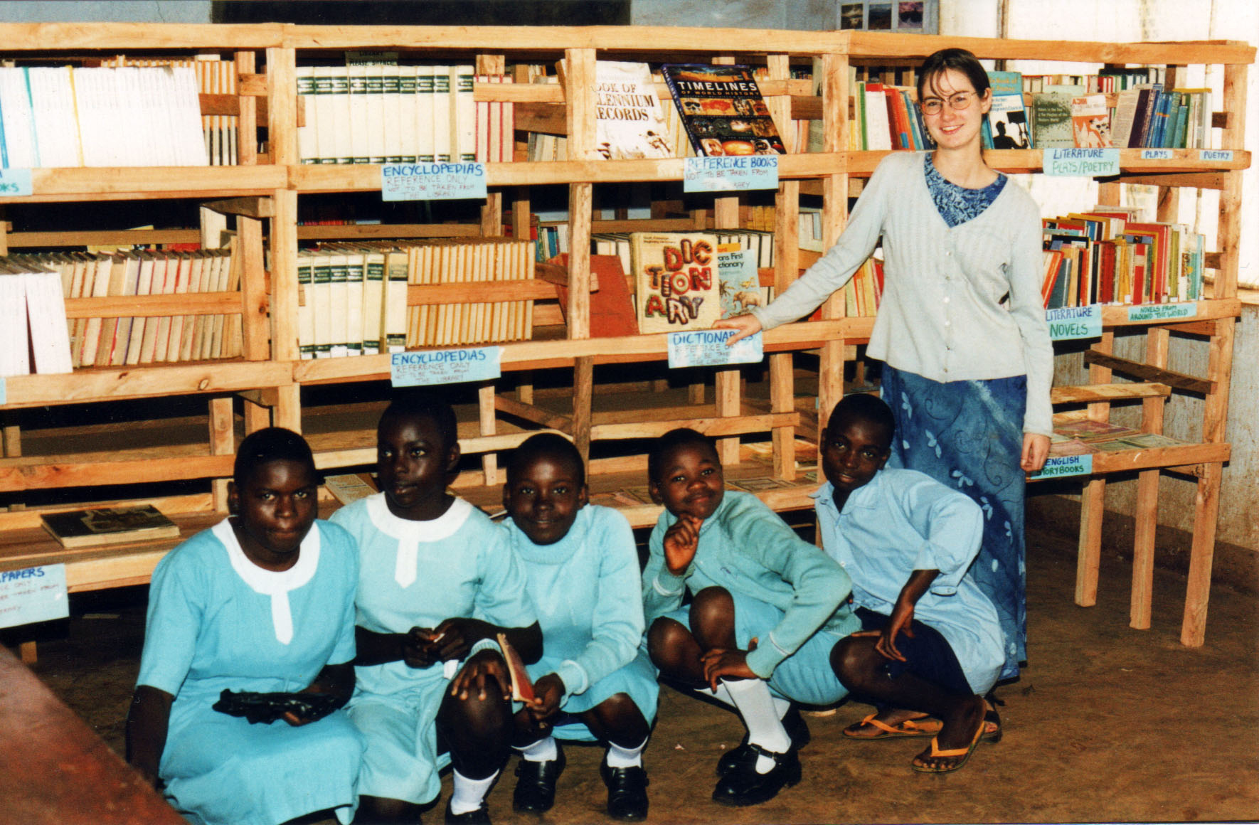 Victoria and students setting up the library in PSS Nkambe, Cameroon