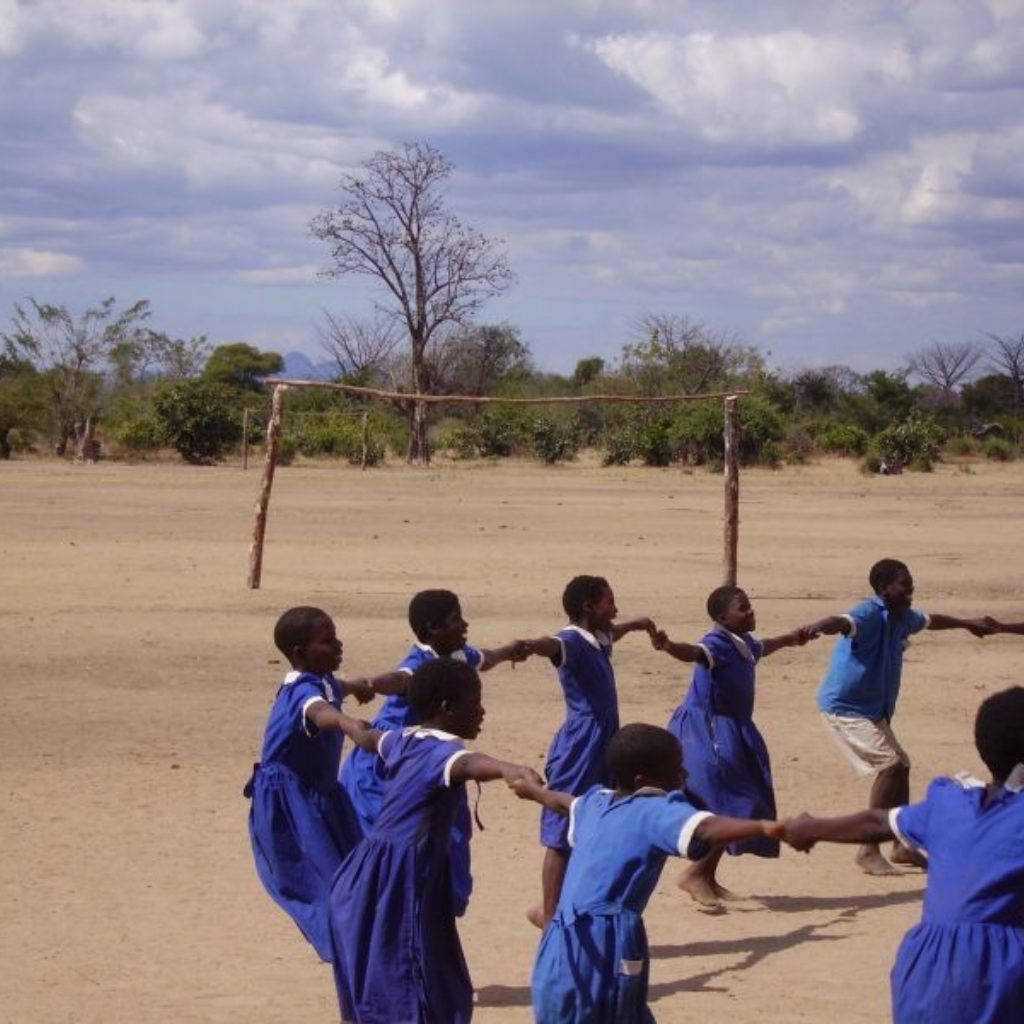 12 Malawi primary school PE lesson on a football pitch